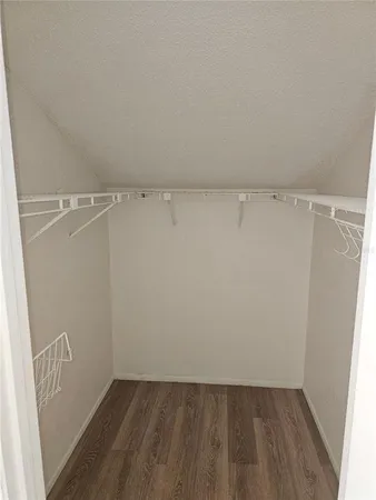 a view of a room with racks on the wall