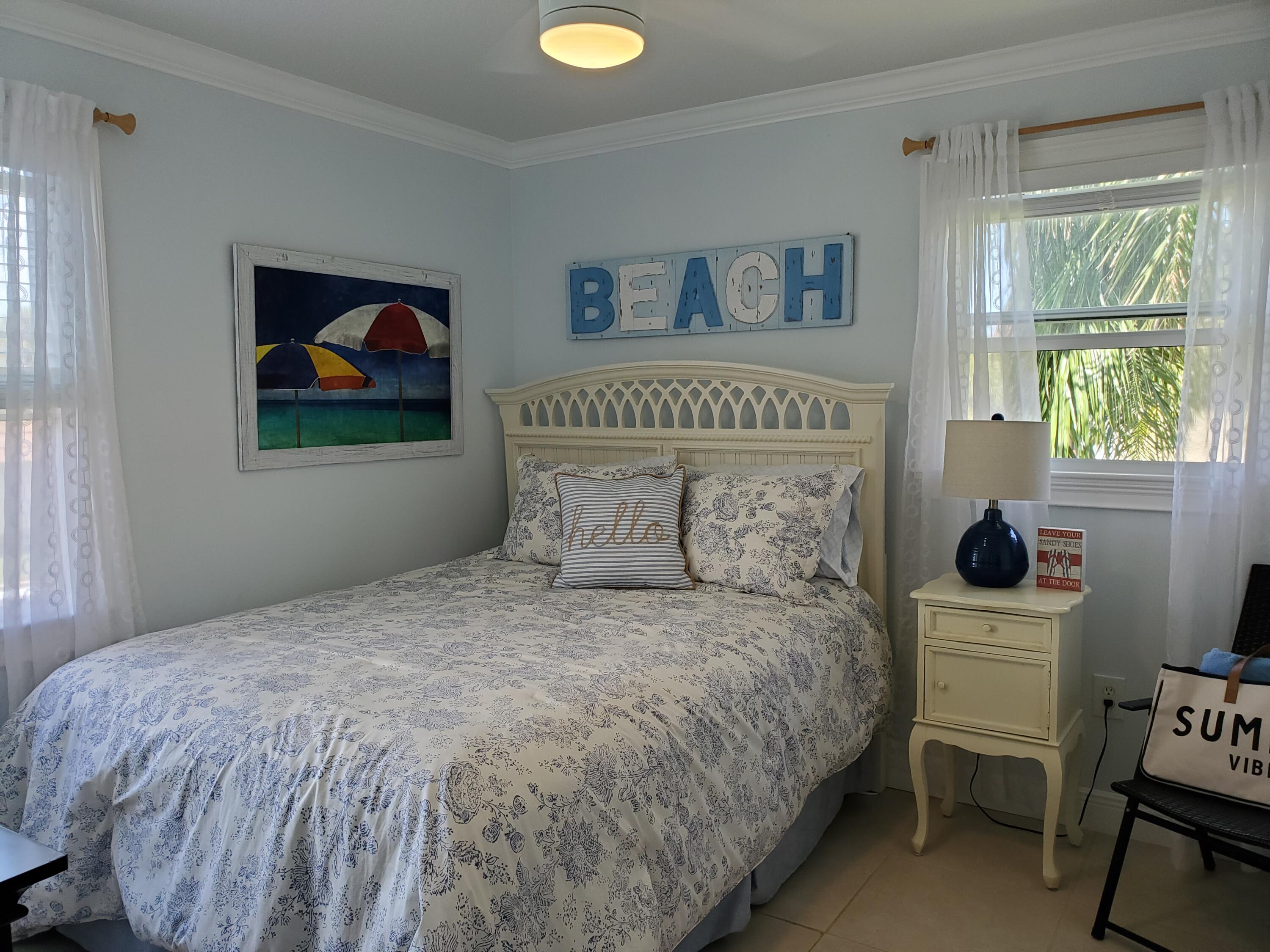 717 Highway 1, Unit 211 Jupiter, FL 33477 - Photo 13 of 25 Guest room queen bed