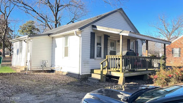 a view of balcony with a swimming pool