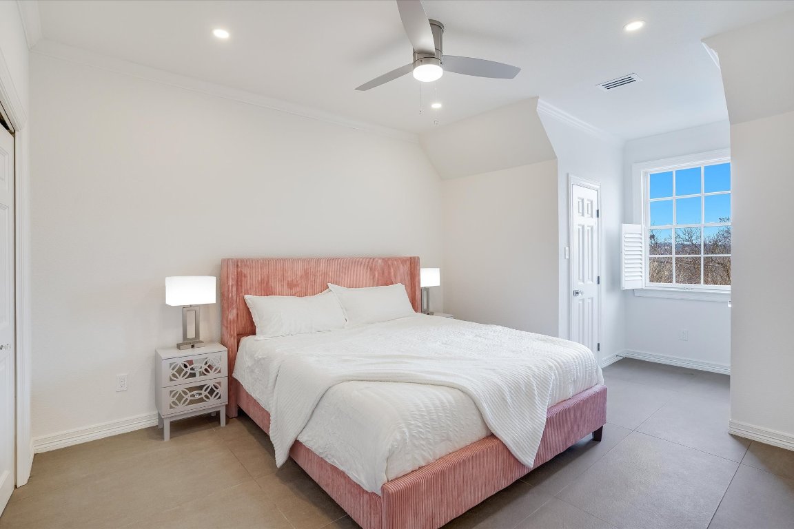 3705 Gilbert Street, Unit B Austin, TX 78703 - Photo 23 of 35 a bedroom with a bed and a window