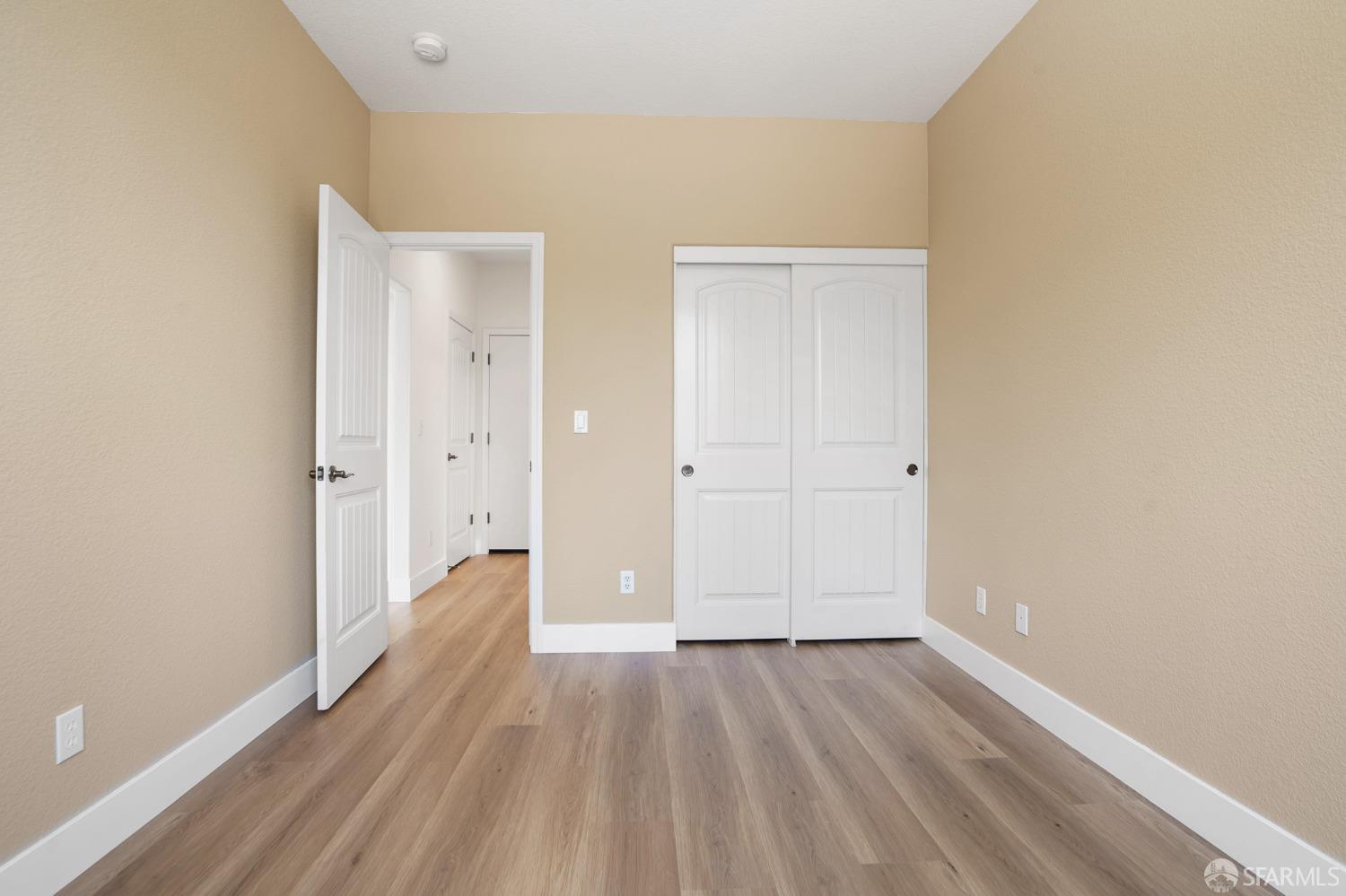 5290 Sungrove Way Antioch, CA 94531 - Photo 19 of 47 a view of a hallway with wooden floor