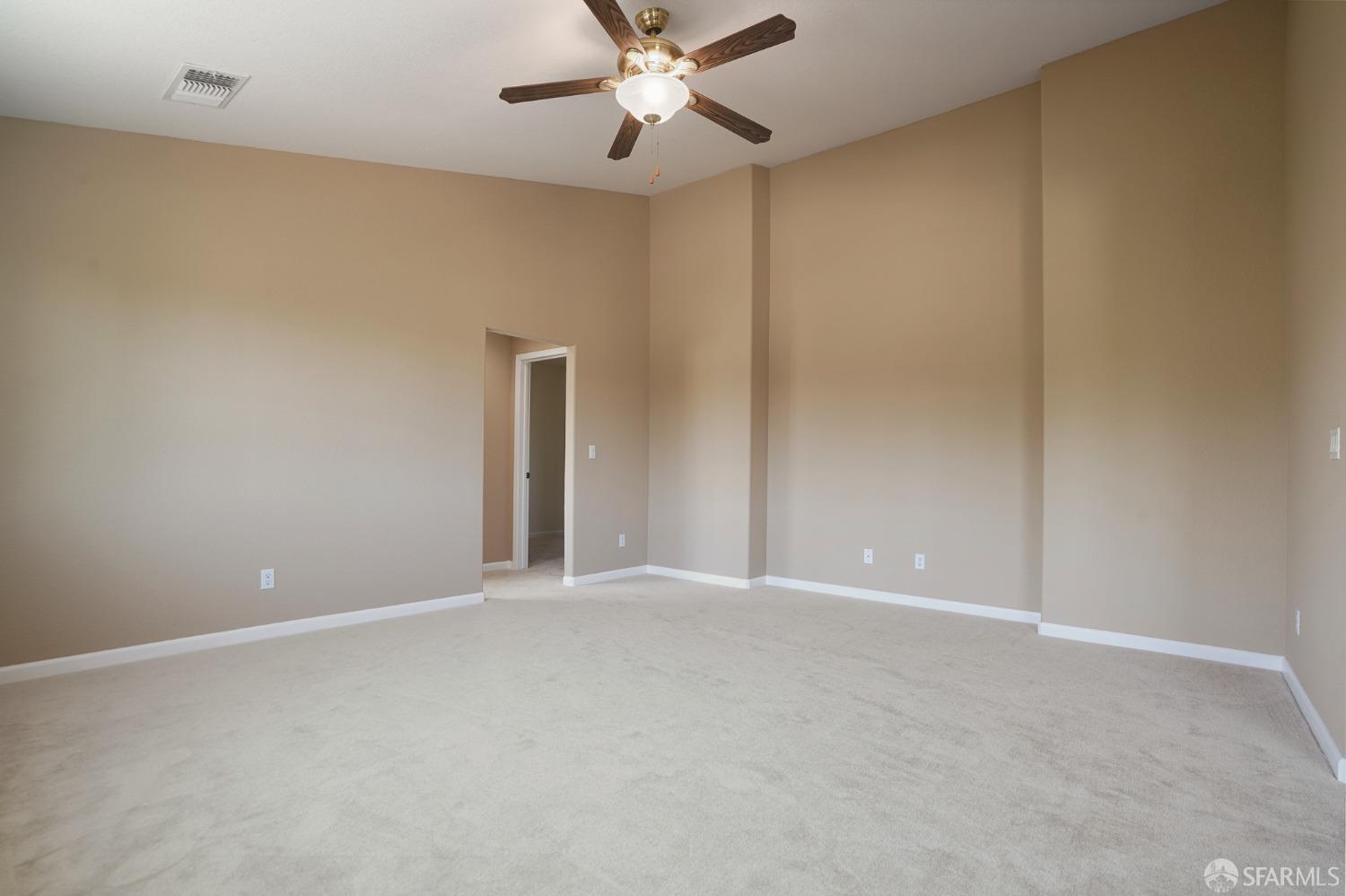 5290 Sungrove Way Antioch, CA 94531 - Photo 30 of 47 a view of an empty room with a ceiling fan