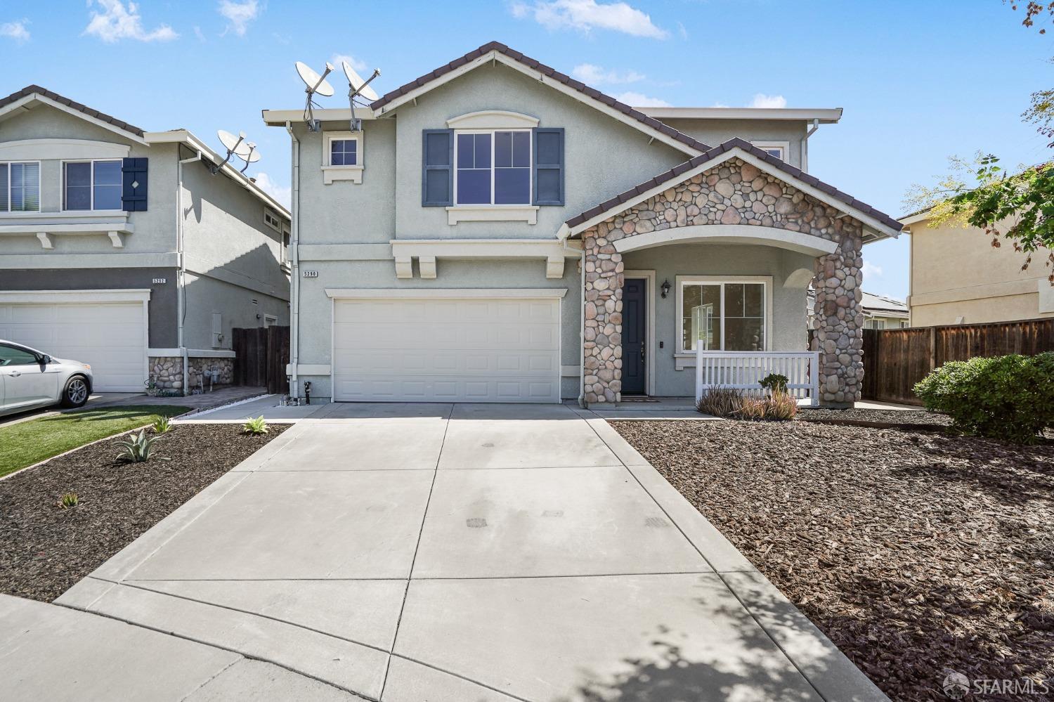 5290 Sungrove Way Antioch, CA 94531 - Photo 3 of 47 a front view of a house with a yard