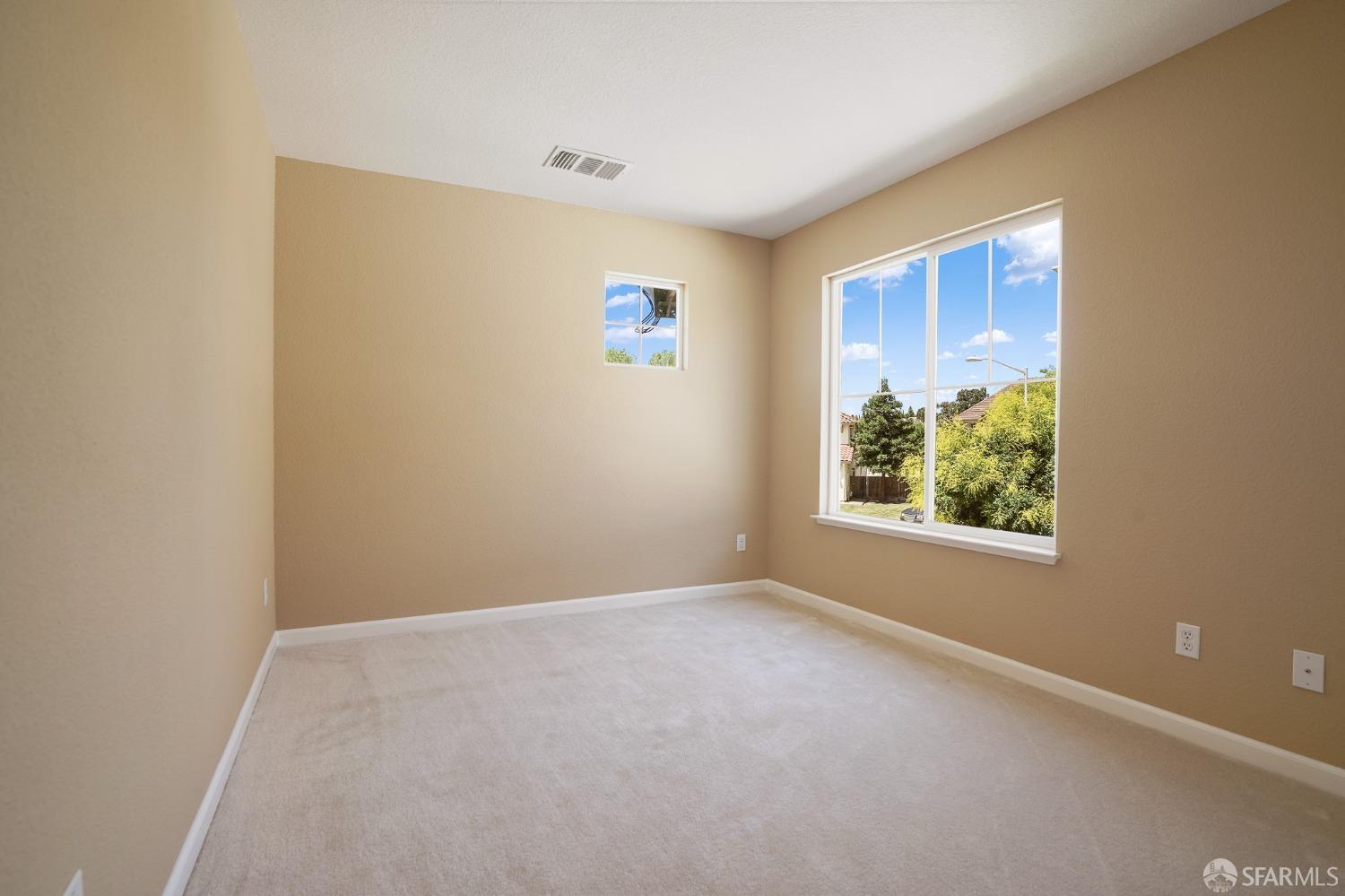 5290 Sungrove Way Antioch, CA 94531 - Photo 36 of 47 an empty room with windows
