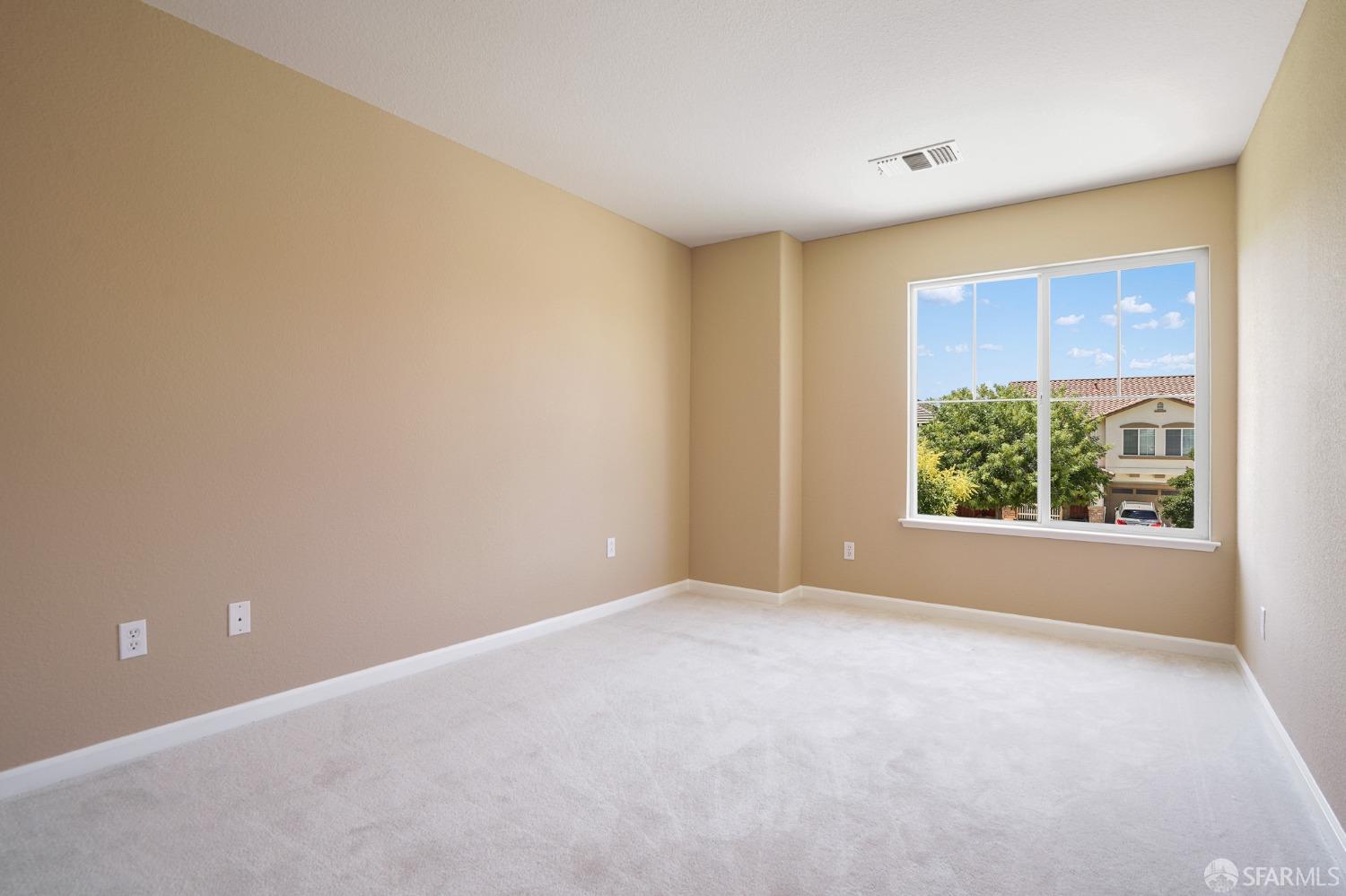 5290 Sungrove Way Antioch, CA 94531 - Photo 37 of 47 a view of an empty room with a window