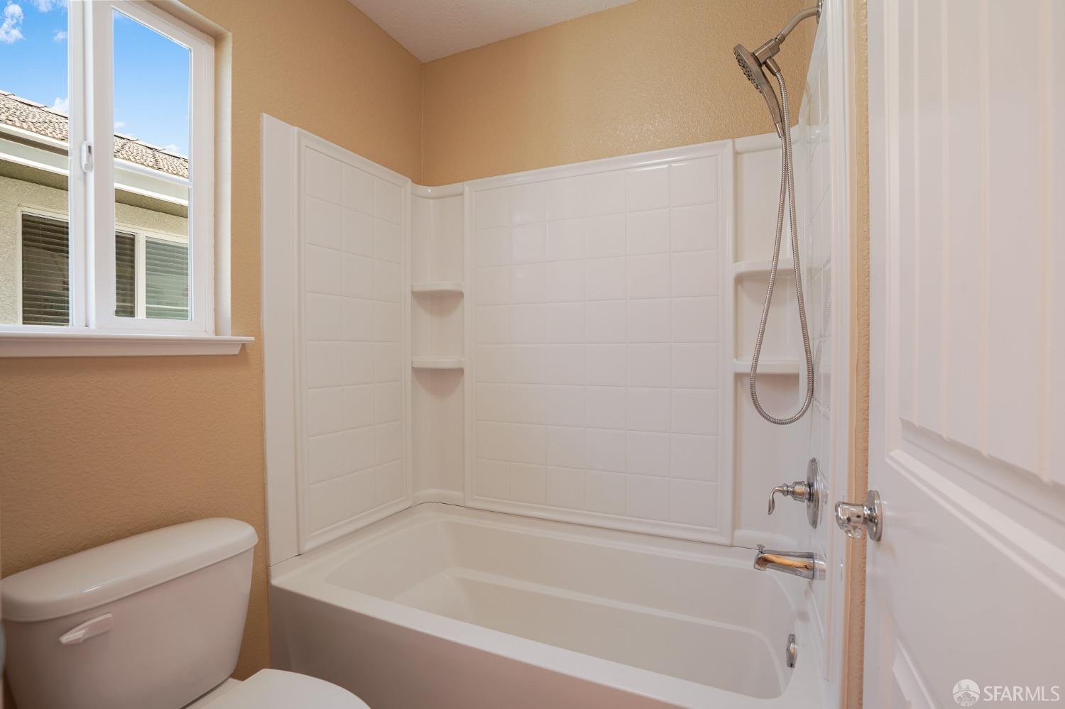 5290 Sungrove Way Antioch, CA 94531 - Photo 39 of 47 a bathroom with a toilet and a bathtub