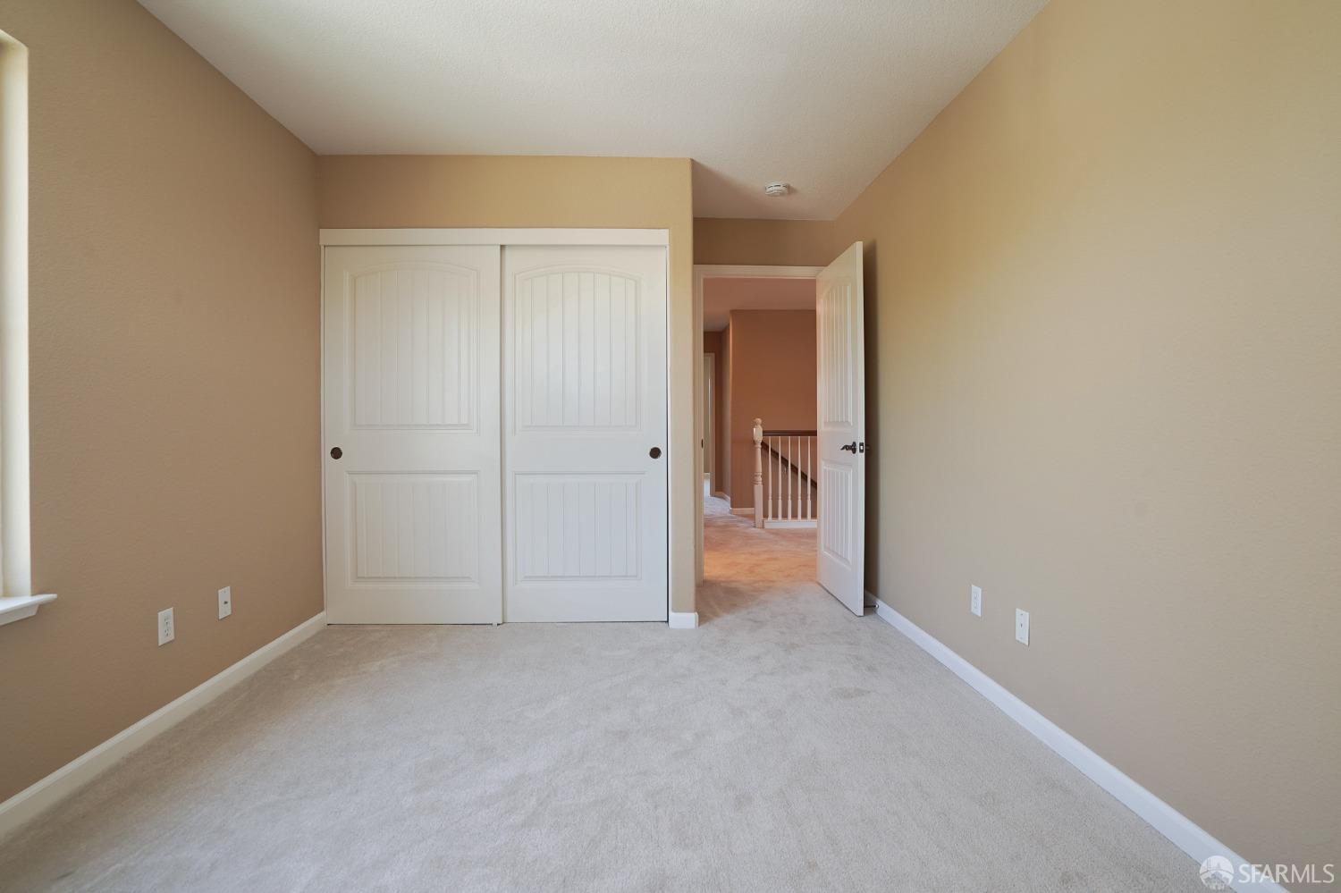 5290 Sungrove Way Antioch, CA 94531 - Photo 40 of 47 wooden floor and cabinet in an empty room