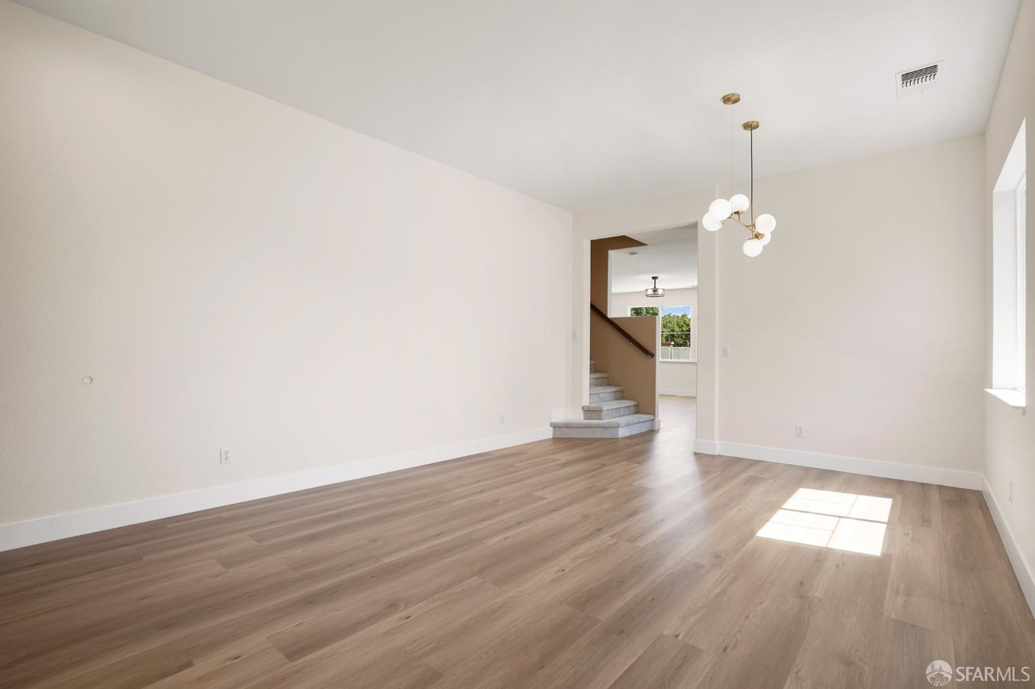 5290 Sungrove Way Antioch, CA 94531 - Photo 6 of 47 a view of a room with wooden floor