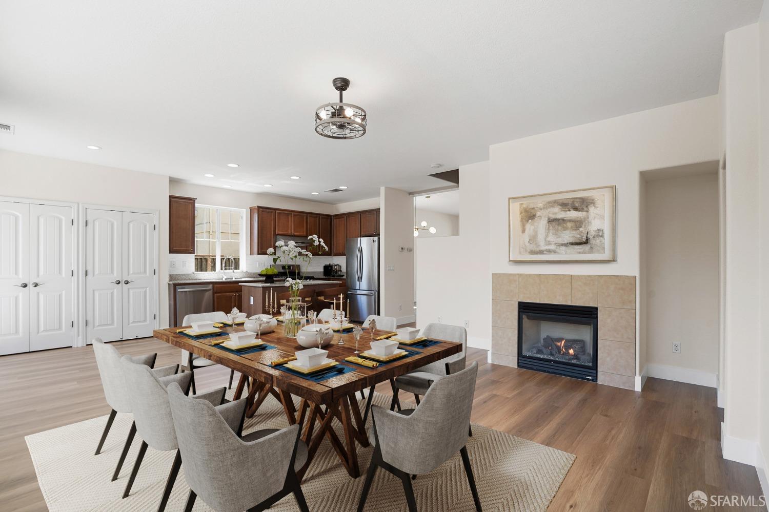 5290 Sungrove Way Antioch, CA 94531 - Photo 8 of 47 a view of a dining room with furniture wooden floor and a fireplace