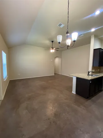a view of a room with a chandelier