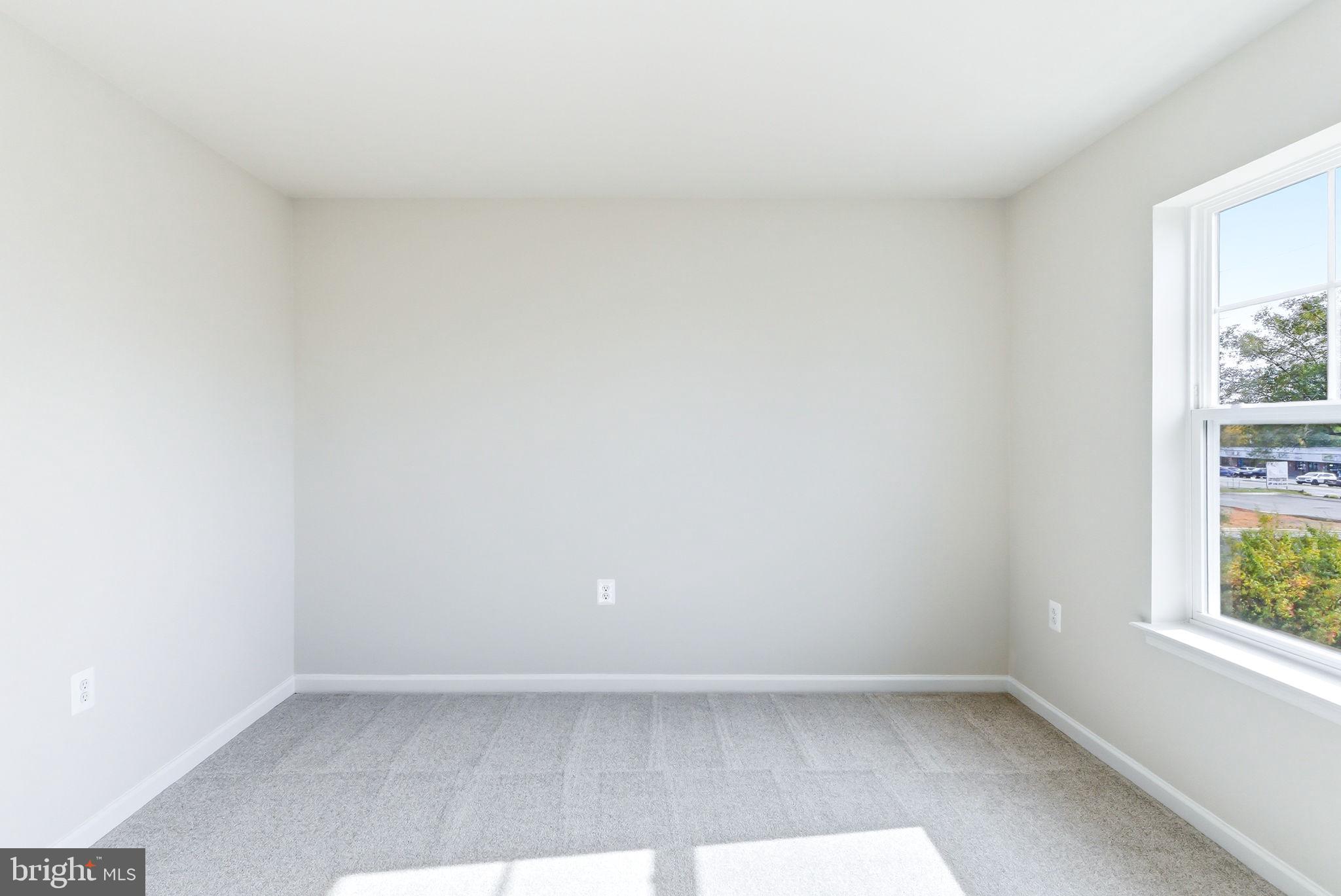 209 Monteith Drive Winchester, VA 22601 - Photo 13 of 29 a view of an empty room and window