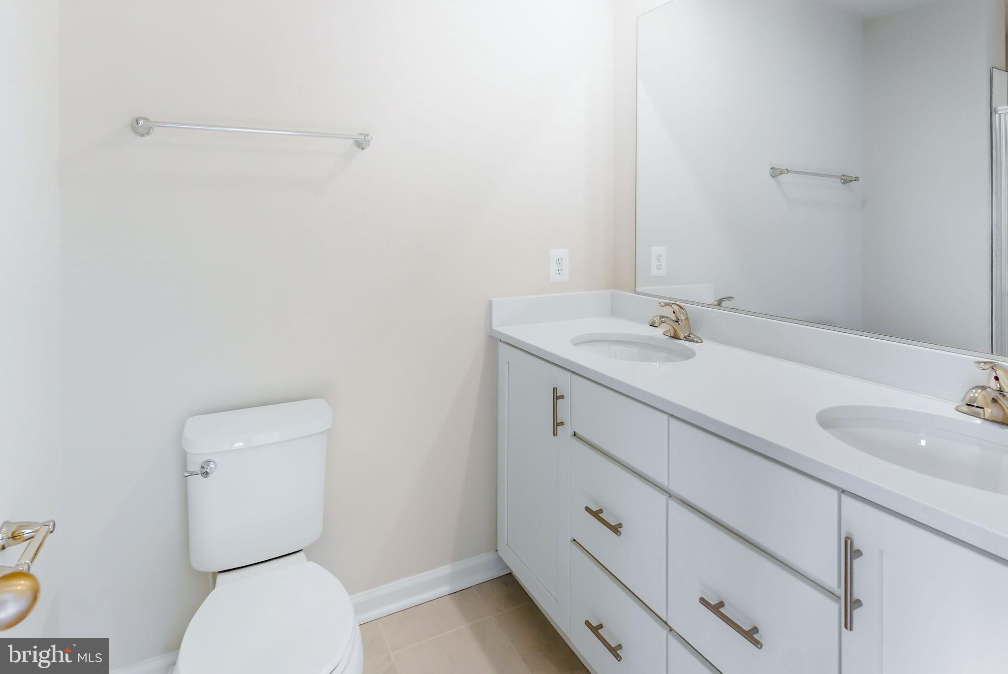 209 Monteith Drive Winchester, VA 22601 - Photo 14 of 29 a bathroom with a sink and a toilet