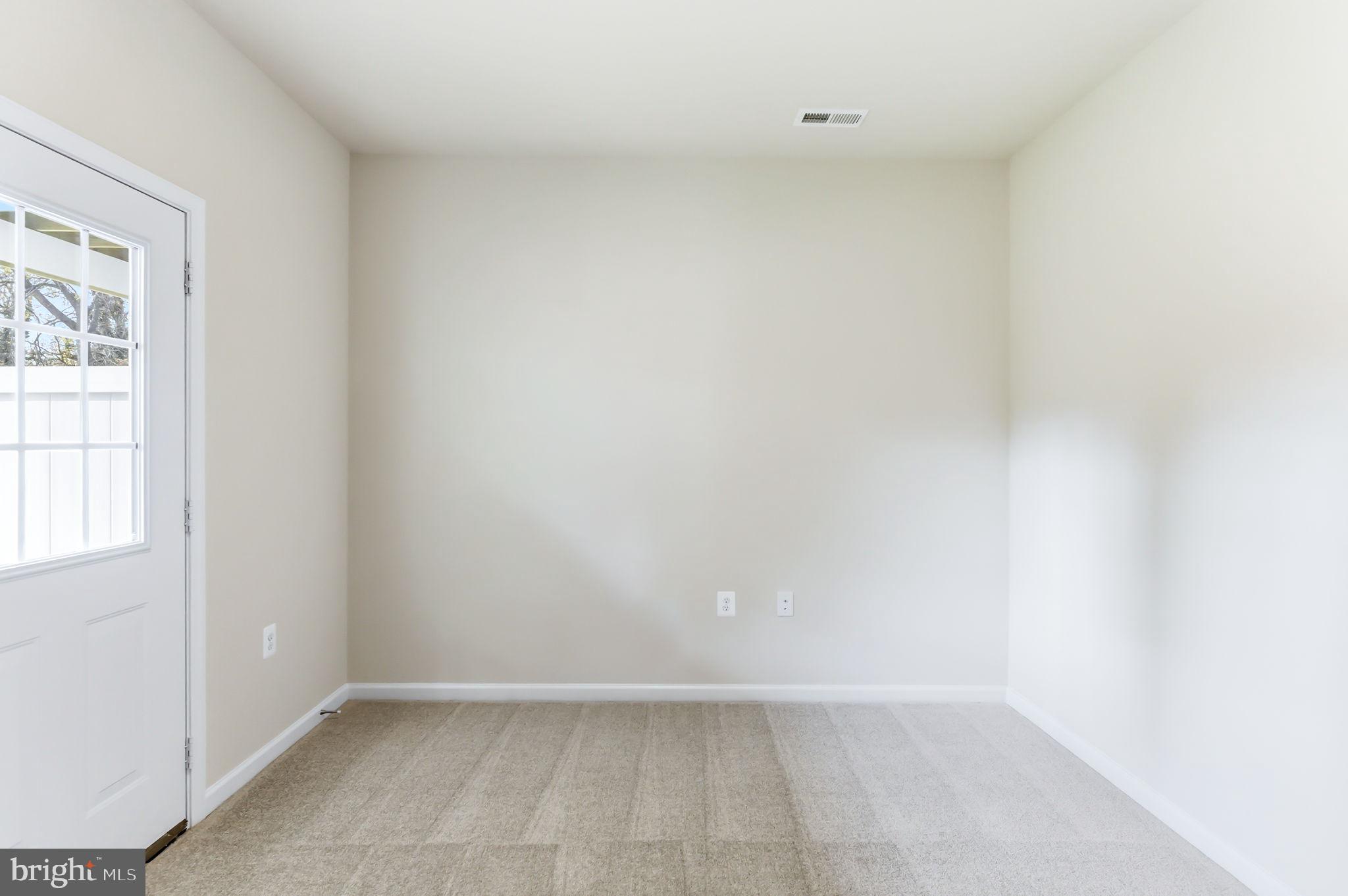 209 Monteith Drive Winchester, VA 22601 - Photo 22 of 29 an empty room with windows