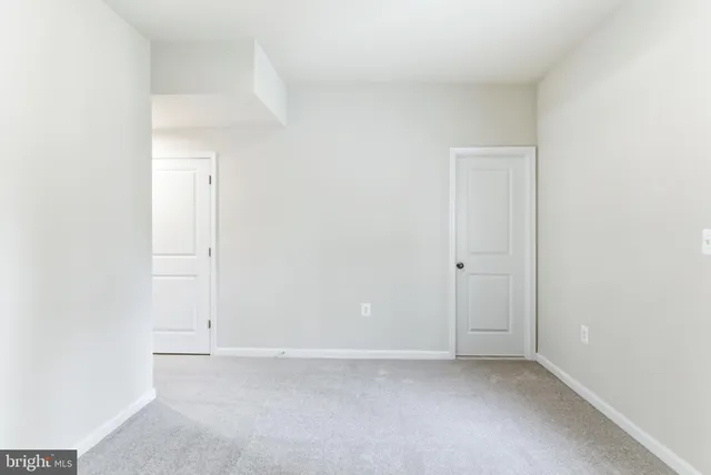 a view of a wooden deck with a yard