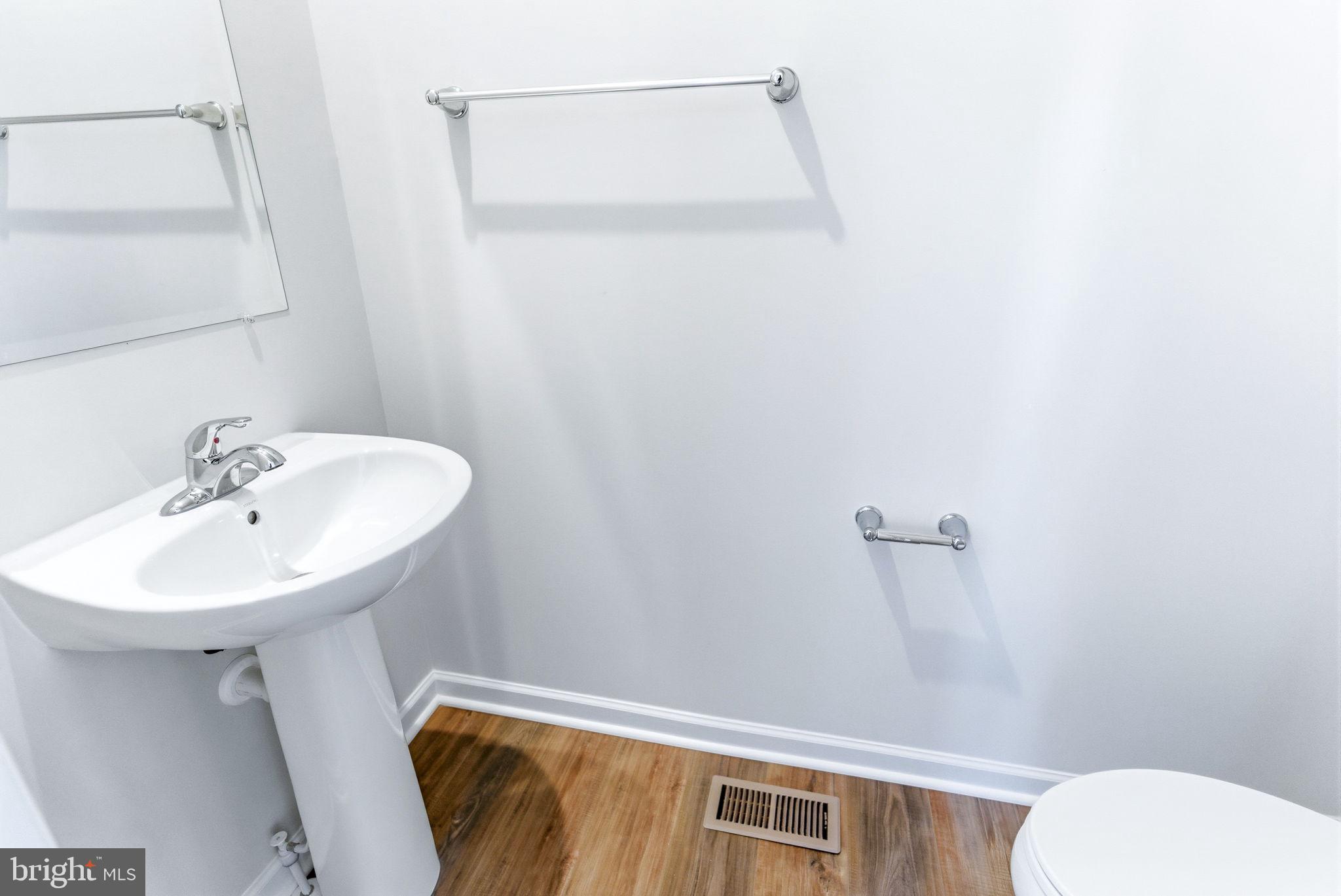 209 Monteith Drive Winchester, VA 22601 - Photo 26 of 29 a bathroom with a sink a toilet and shower