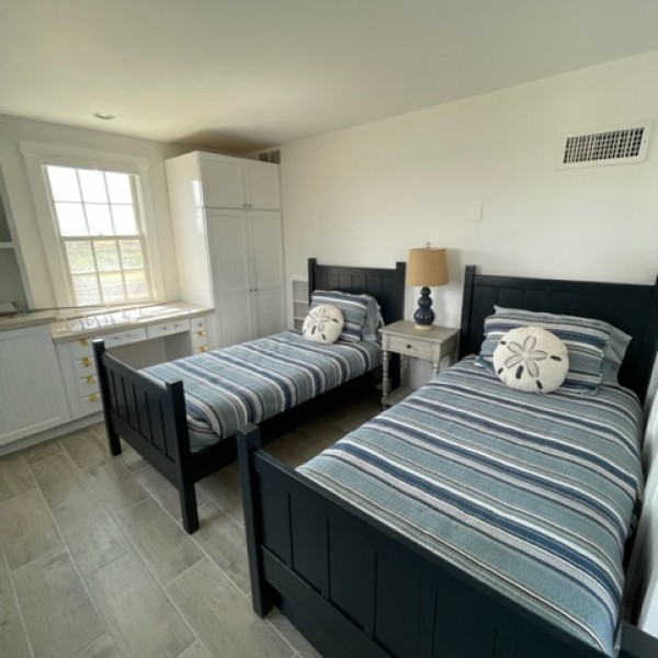 22 Sheep Pond Road Nantucket, MA 02554 - Photo 25 of 27 a bedroom with two beds and a window
