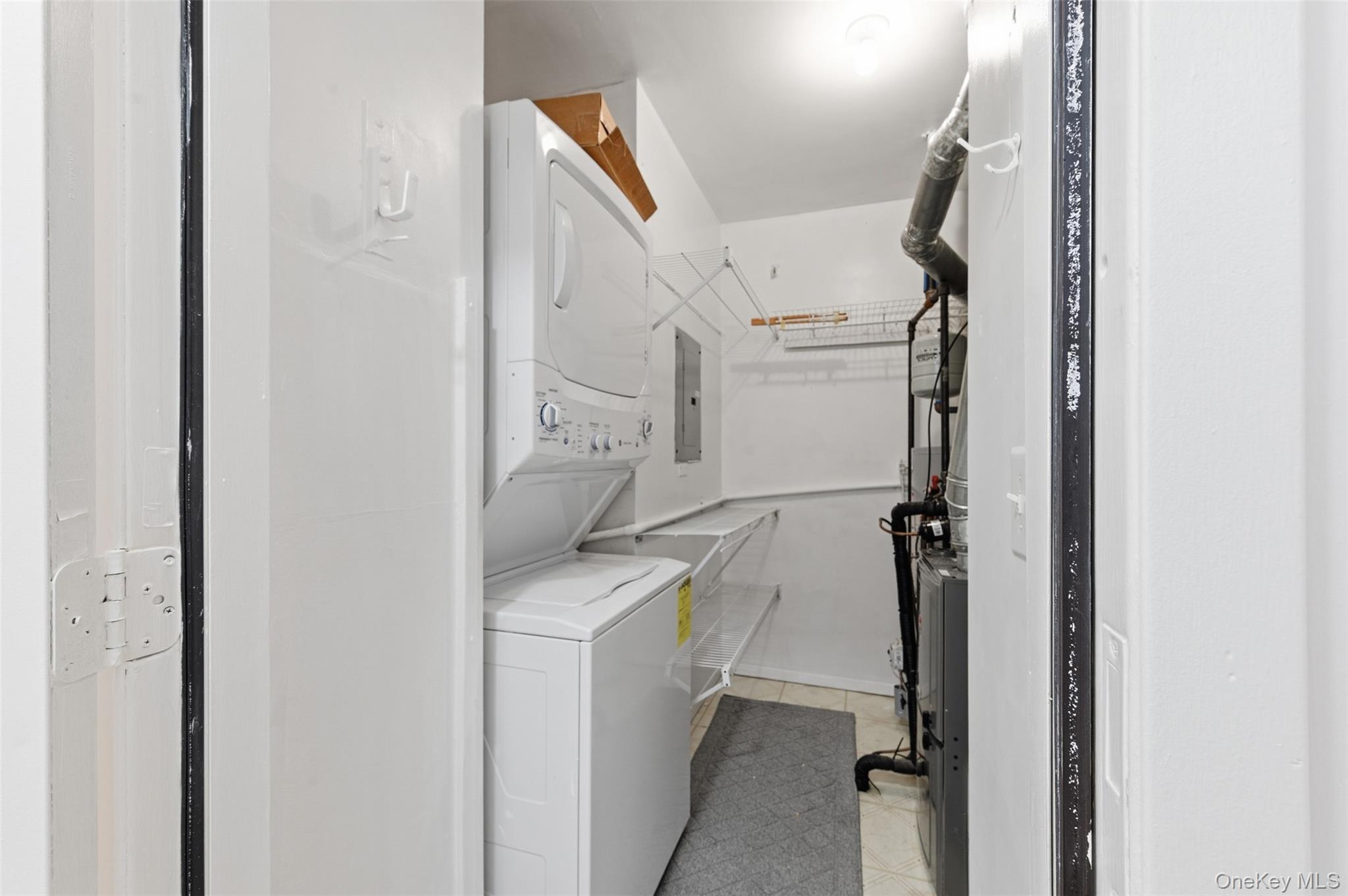763 Spring Lake Drive Middle Island, NY 11953 - Photo 13 of 31 a utility room with dryer and washer