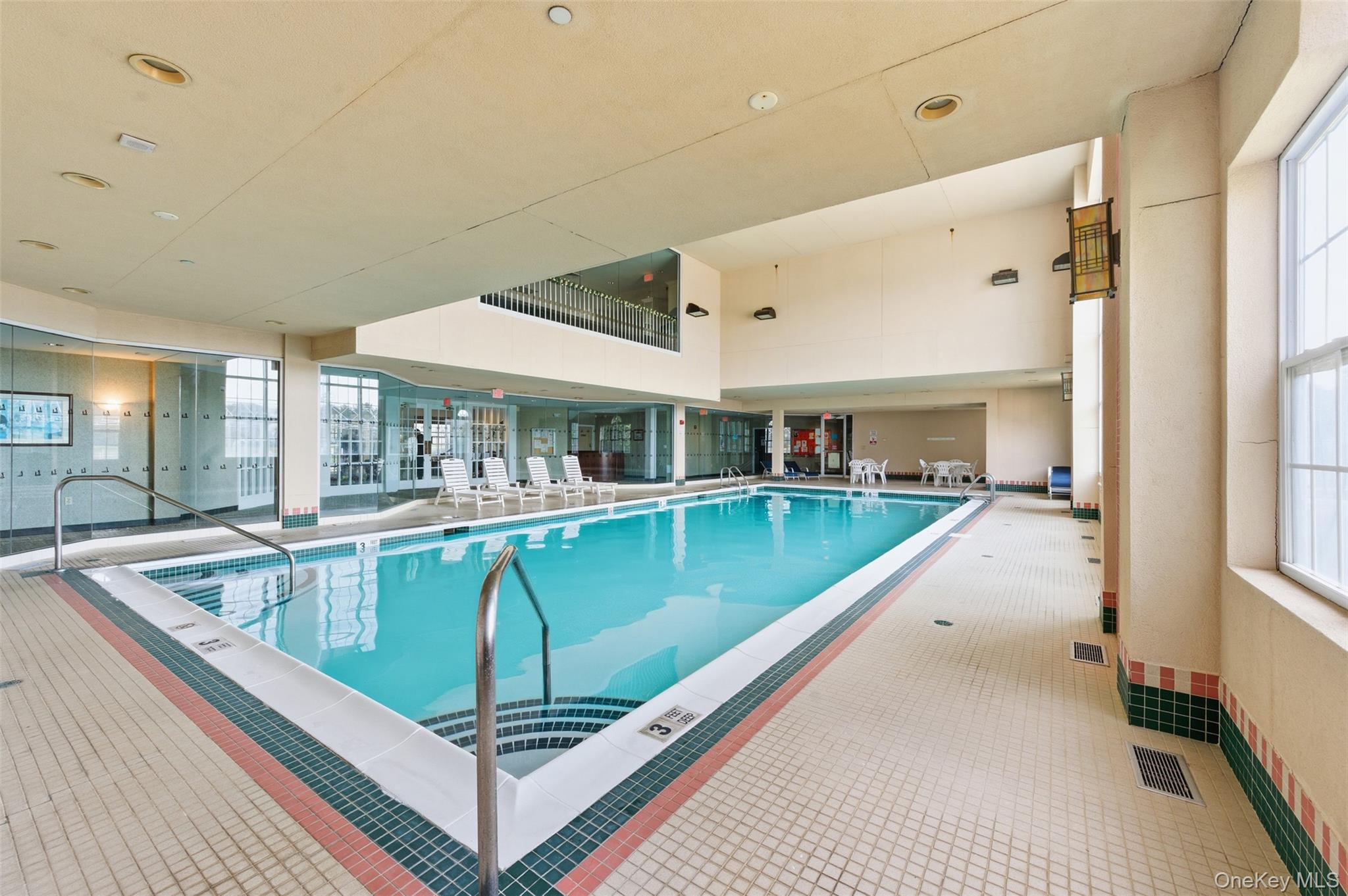 763 Spring Lake Drive Middle Island, NY 11953 - Photo 21 of 31 a view of a swimming pool with a balcony