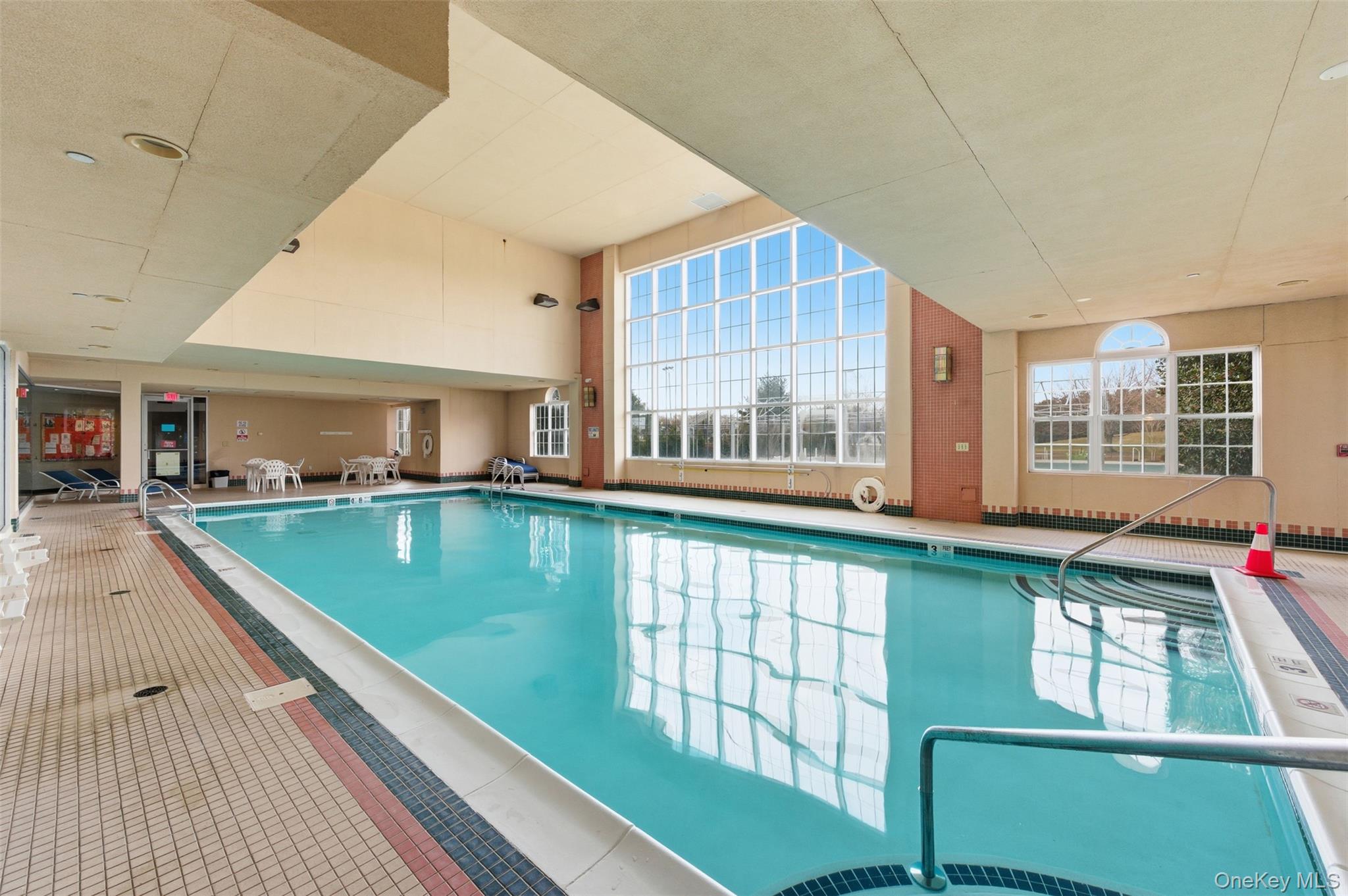 763 Spring Lake Drive Middle Island, NY 11953 - Photo 22 of 31 a view of a house with a swimming pool