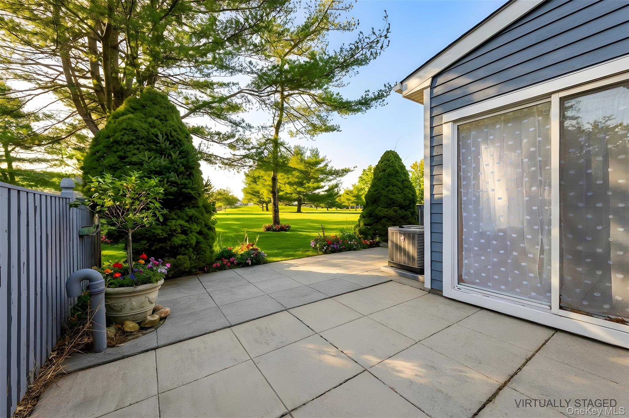 763 Spring Lake Drive Middle Island, NY 11953 - Photo 29 of 31 a view of a garden with sitting area