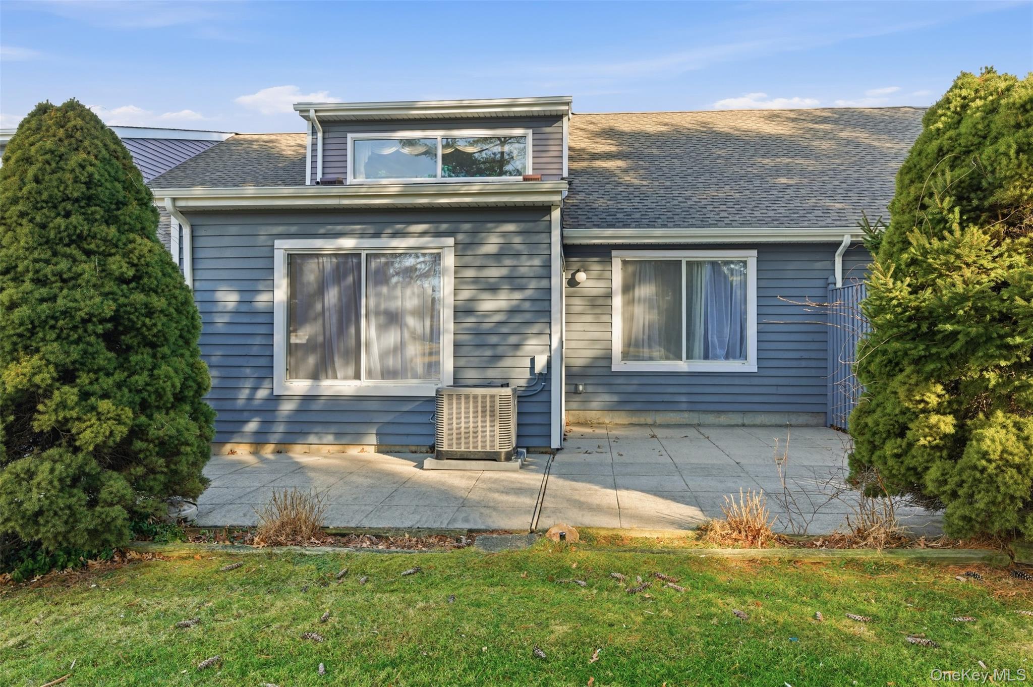 763 Spring Lake Drive Middle Island, NY 11953 - Photo 31 of 31 a view of a house with a yard and plants
