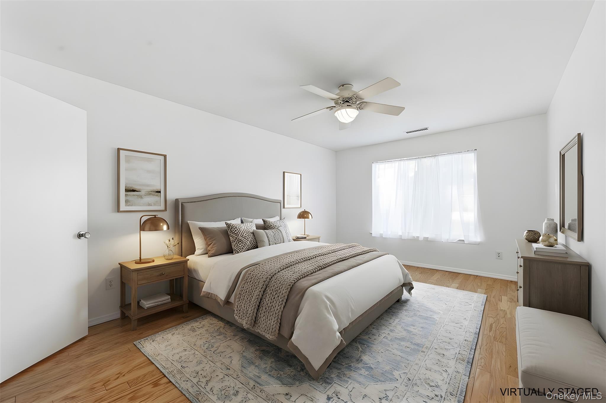 763 Spring Lake Drive Middle Island, NY 11953 - Photo 4 of 31 a bedroom with a large bed and a chandelier