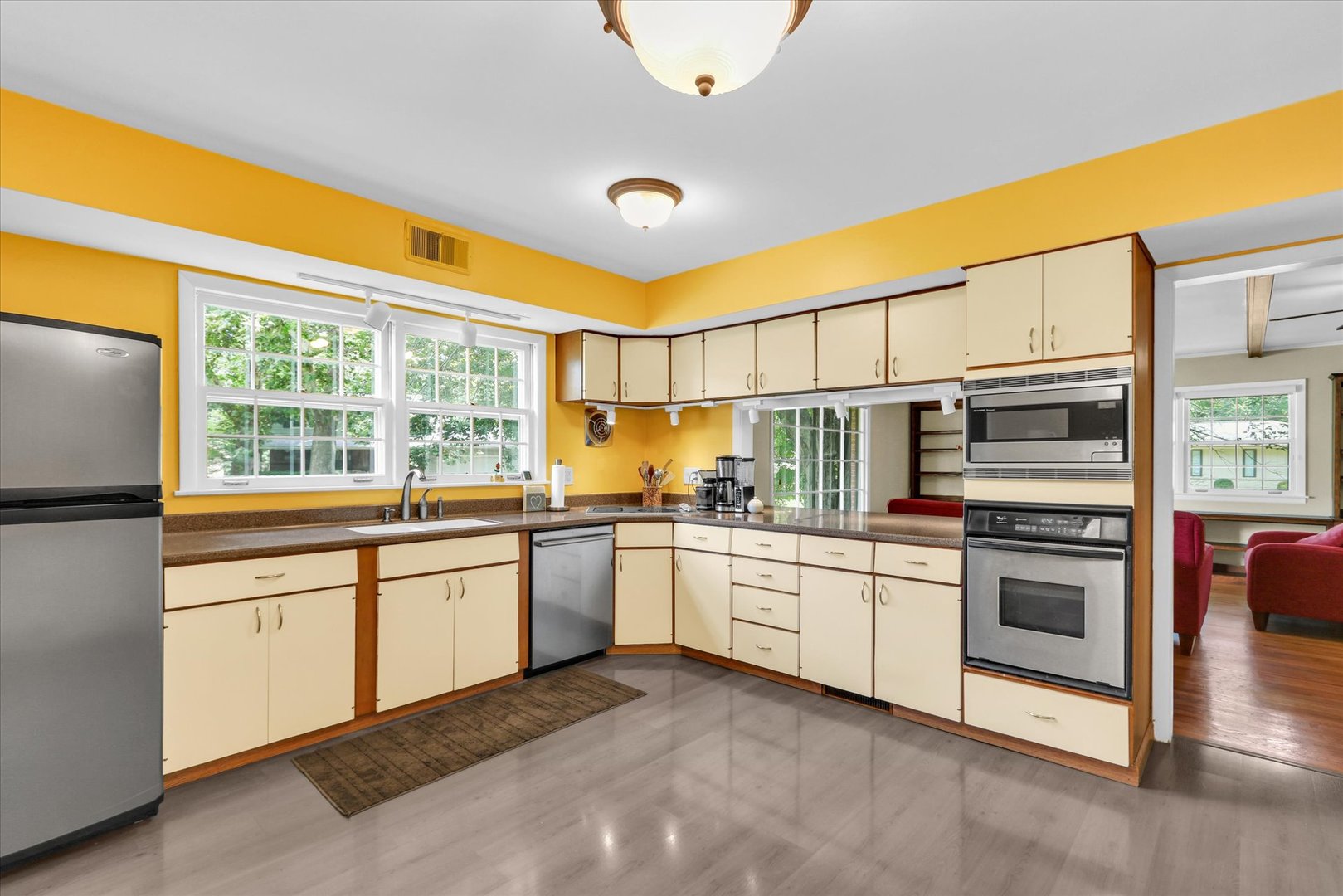 1202 Foothill Drive Champaign, IL 61821 - Photo 12 of 53 a kitchen with stainless steel appliances granite countertop a stove and a sink