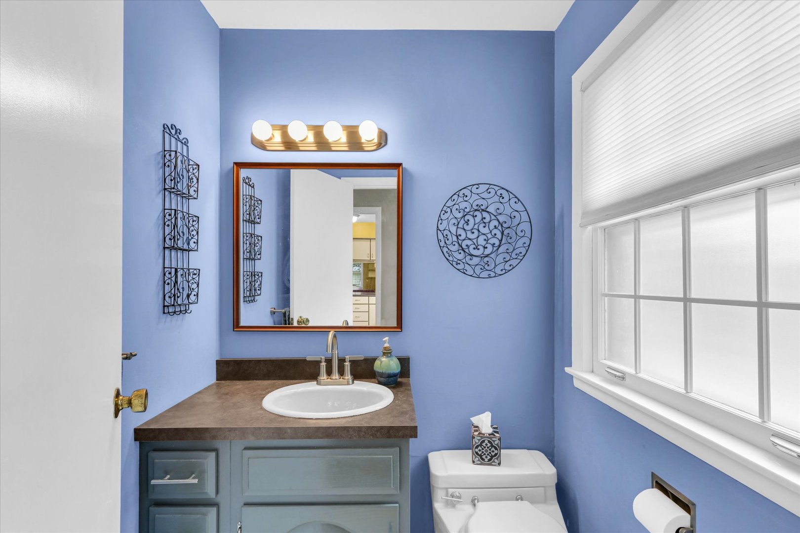 1202 Foothill Drive Champaign, IL 61821 - Photo 22 of 53 a bathroom with a sink and a mirror