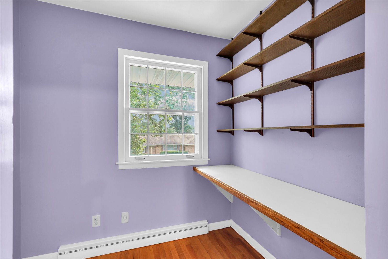 1202 Foothill Drive Champaign, IL 61821 - Photo 36 of 53 a view of room with window and a ceiling fan