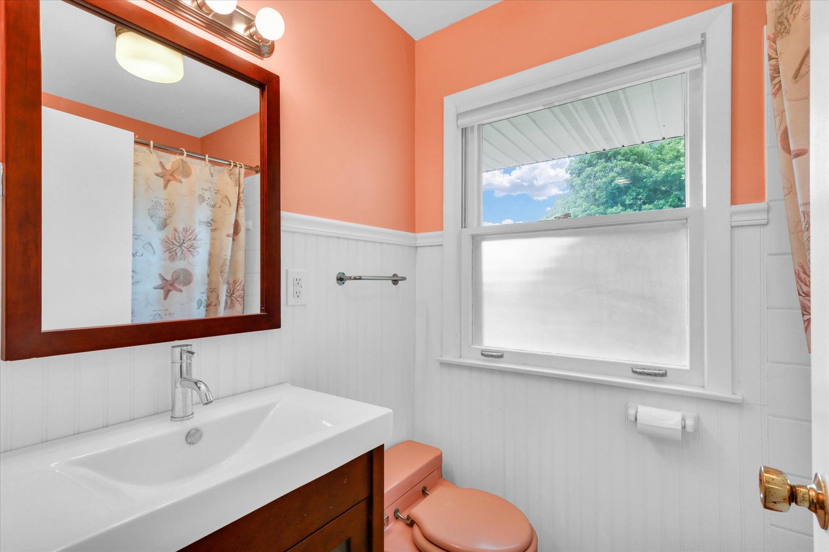 1202 Foothill Drive Champaign, IL 61821 - Photo 37 of 53 a bathroom with a sink mirror and a window