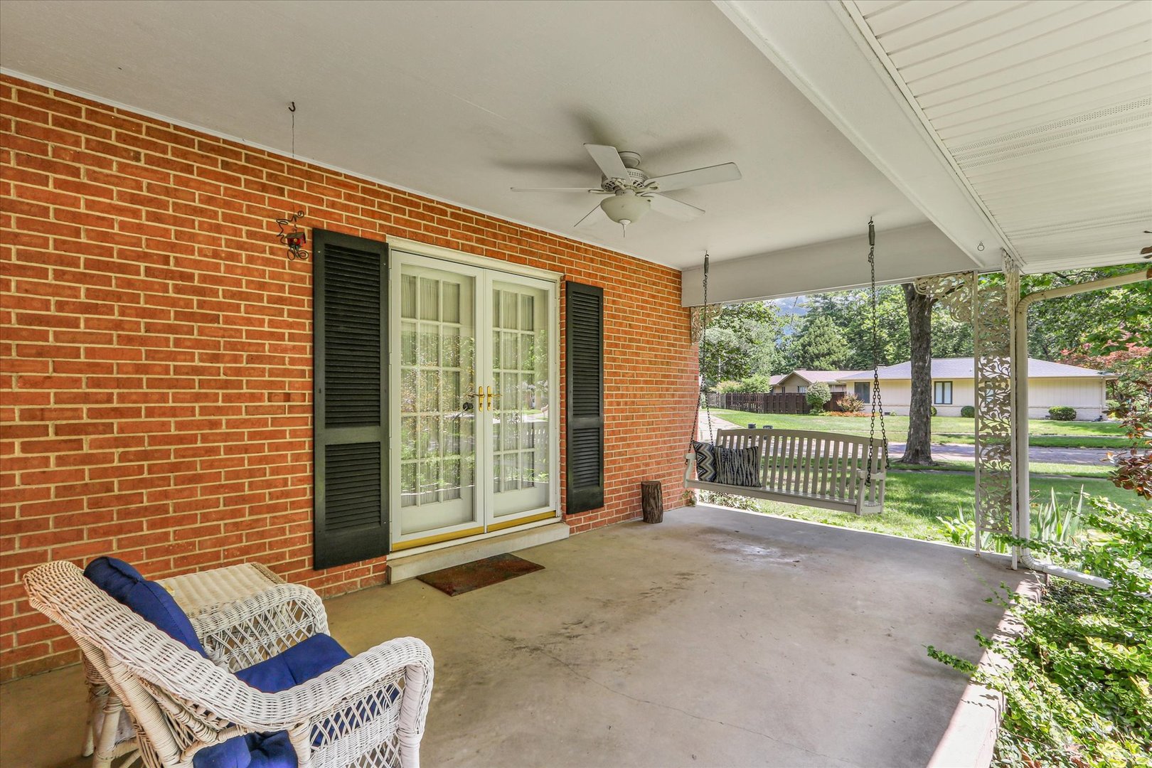 1202 Foothill Drive Champaign, IL 61821 - Photo 5 of 53 a view of a porch with furniture and garden