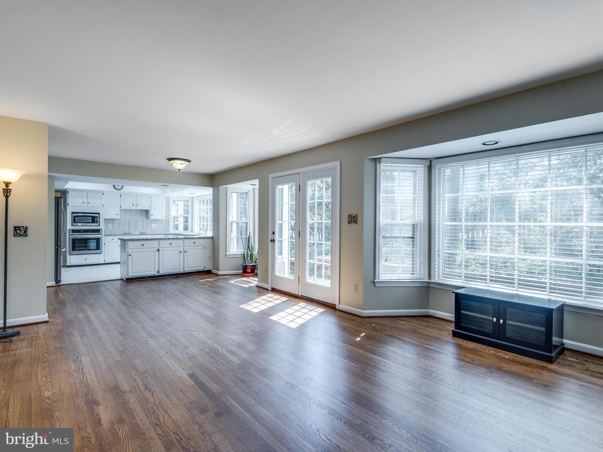 1591 Stowe Road Reston, VA 20194 - Photo 14 of 30 a view of a room with wooden floor and windows