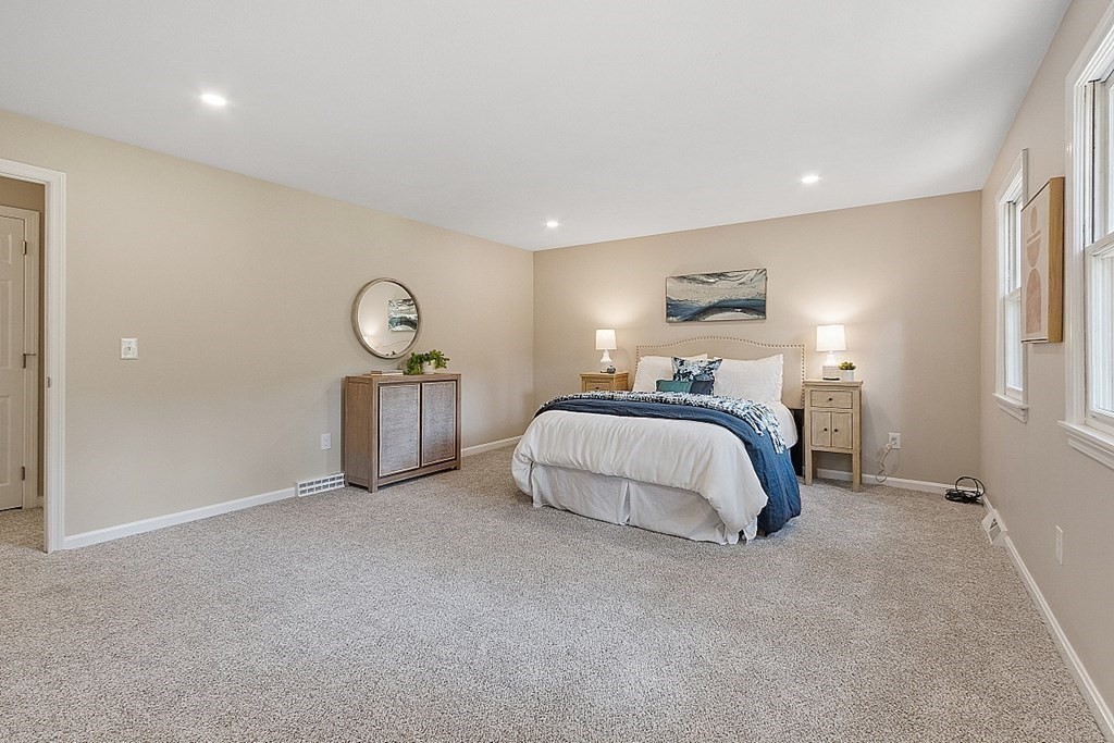 43 R Beaver Brook Road Westford, MA 01886 - Photo 17 of 42 a bedroom with a bed and window