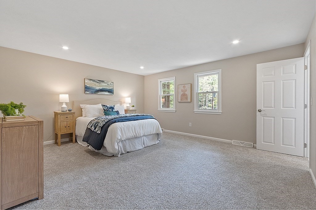 43 R Beaver Brook Road Westford, MA 01886 - Photo 18 of 42 a bedroom with a bed and a window