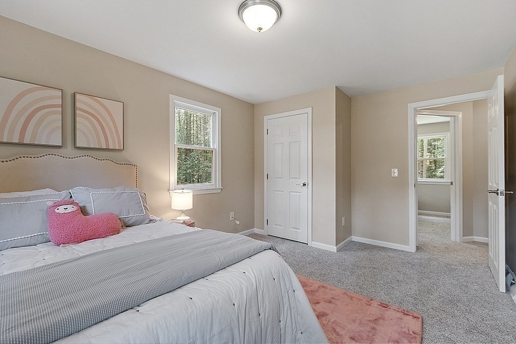 43 R Beaver Brook Road Westford, MA 01886 - Photo 23 of 42 a bedroom with a bed and window
