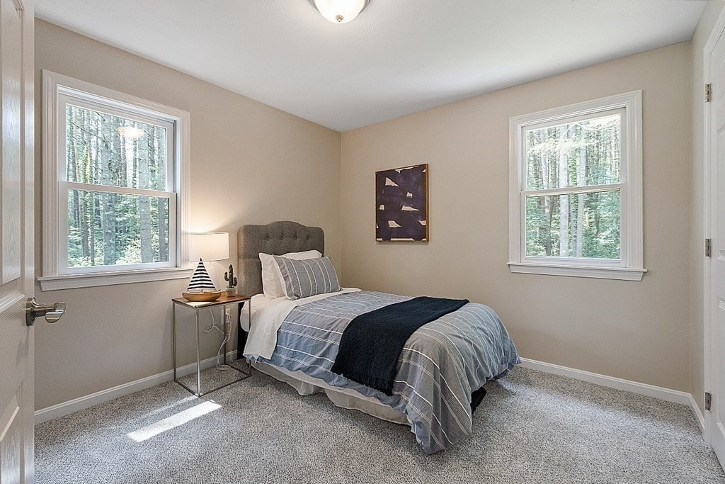 43 R Beaver Brook Road Westford, MA 01886 - Photo 25 of 42 a bedroom with a bed and window
