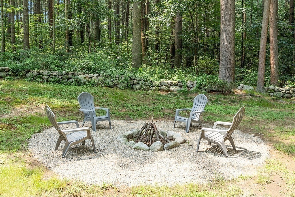 43 R Beaver Brook Road Westford, MA 01886 - Photo 34 of 42 a view of chair and table in the garden