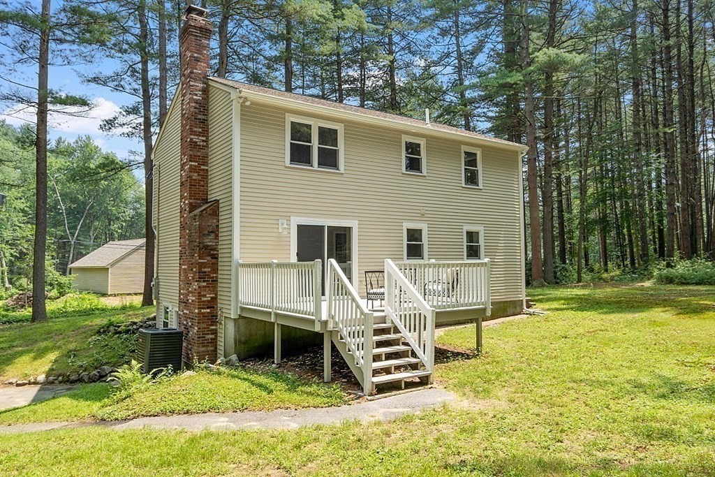 43 R Beaver Brook Road Westford, MA 01886 - Photo 35 of 42 a view of a house with backyard