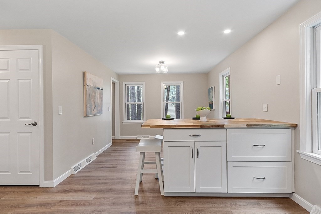 43 R Beaver Brook Road Westford, MA 01886 - Photo 6 of 42 a spacious bathroom with a granite countertop sink a mirror and a