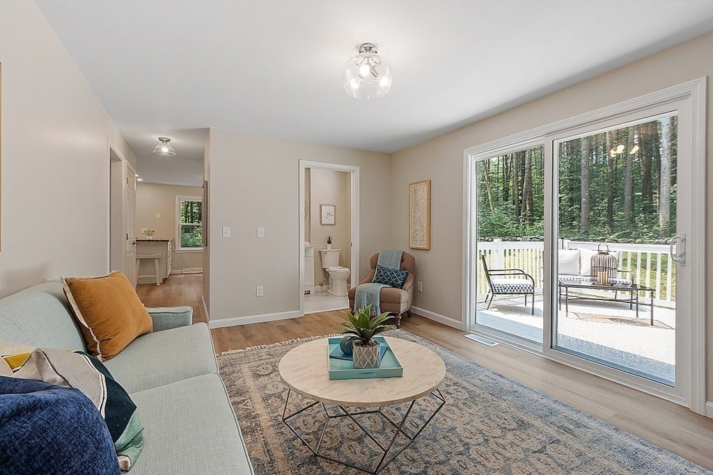 43 R Beaver Brook Road Westford, MA 01886 - Photo 9 of 42 a living room with furniture and a potted plant