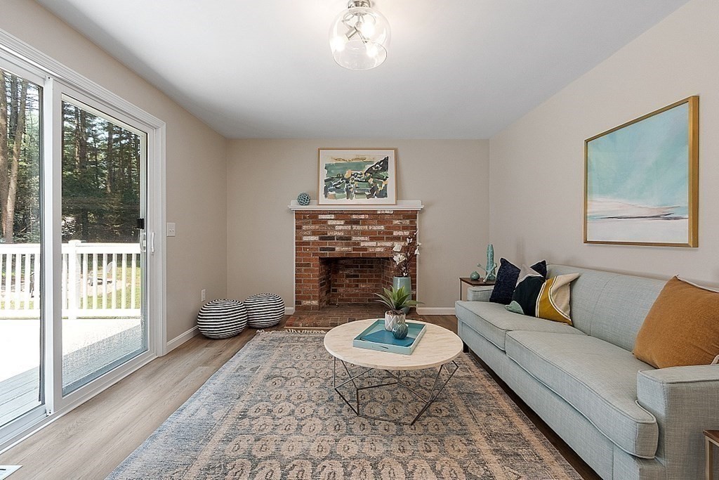 43 R Beaver Brook Road Westford, MA 01886 - Photo 10 of 42 a living room with furniture and a fireplace