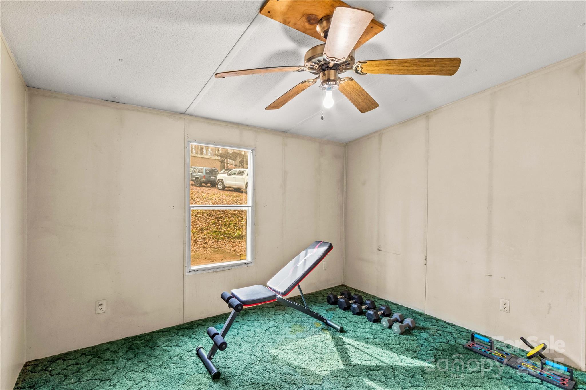 338 Piney Grove Road Harmony, NC 28634 - Photo 29 of 44 a room with musical instruments and windows