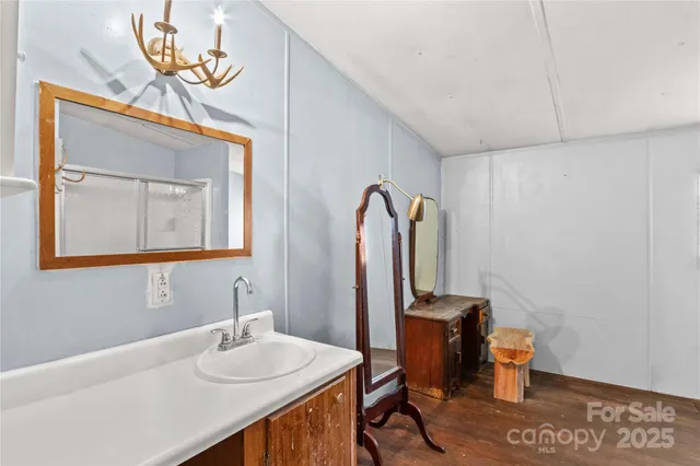 a view of a yard with trees