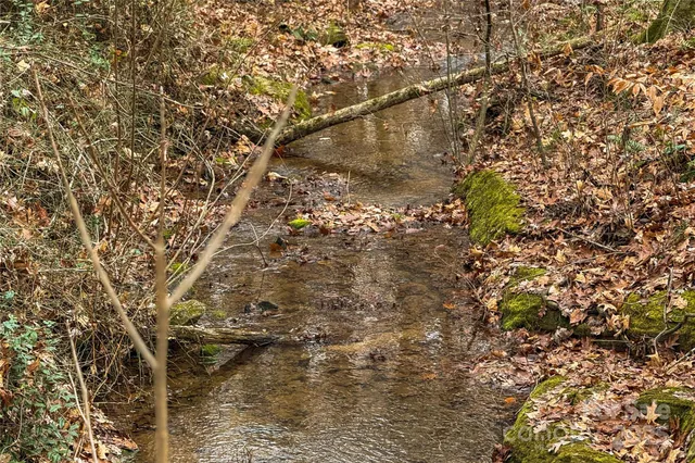 a view of a backyard of the house