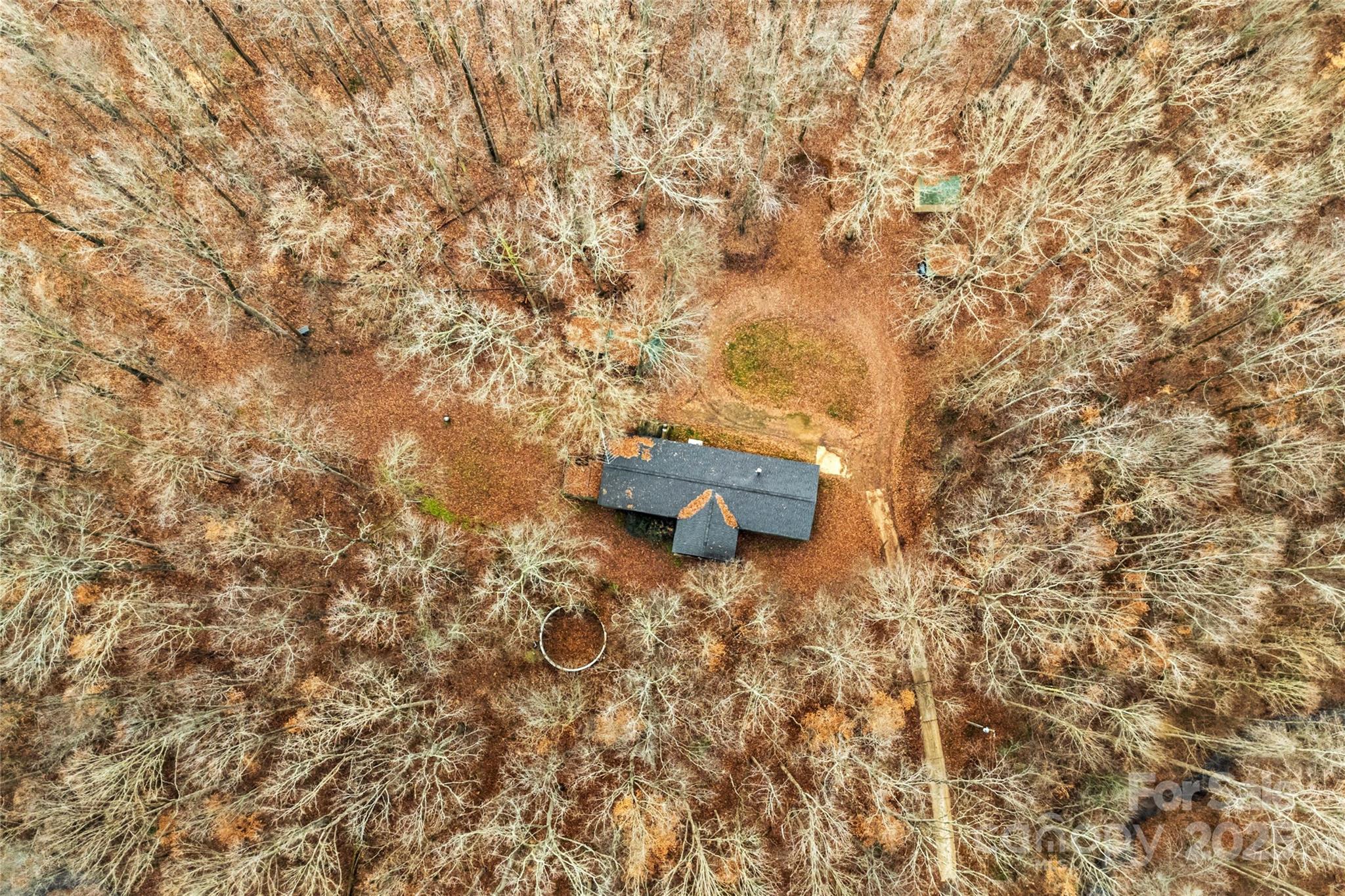 338 Piney Grove Road Harmony, NC 28634 - Photo 6 of 44 a backyard of a house