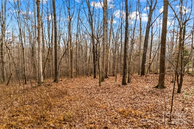 a large room with a large window and outdoor seating