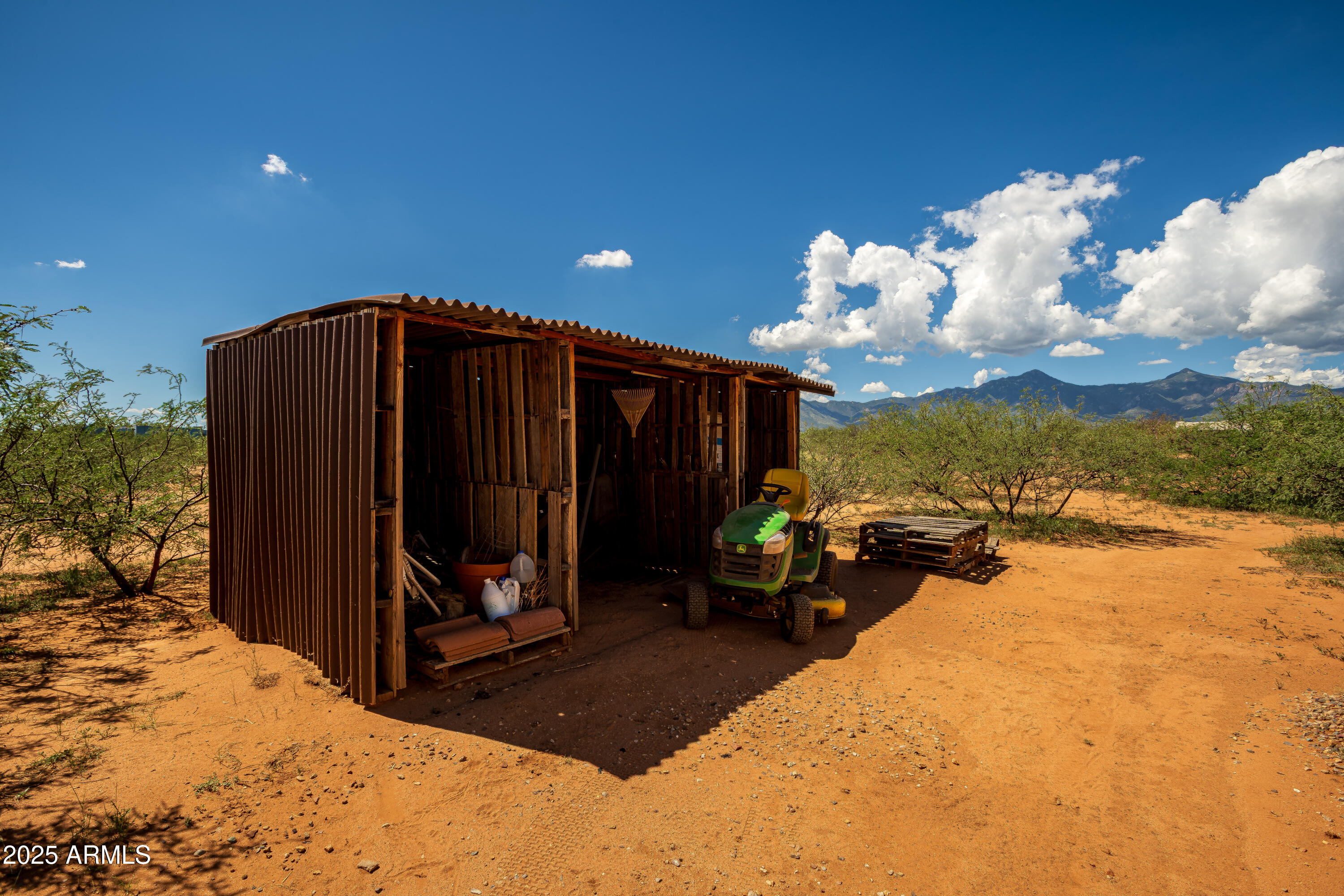 7072 South Ridling Drive Hereford, AZ 85615 - Photo 12 of 69 a view of a two chair in the patio of the house