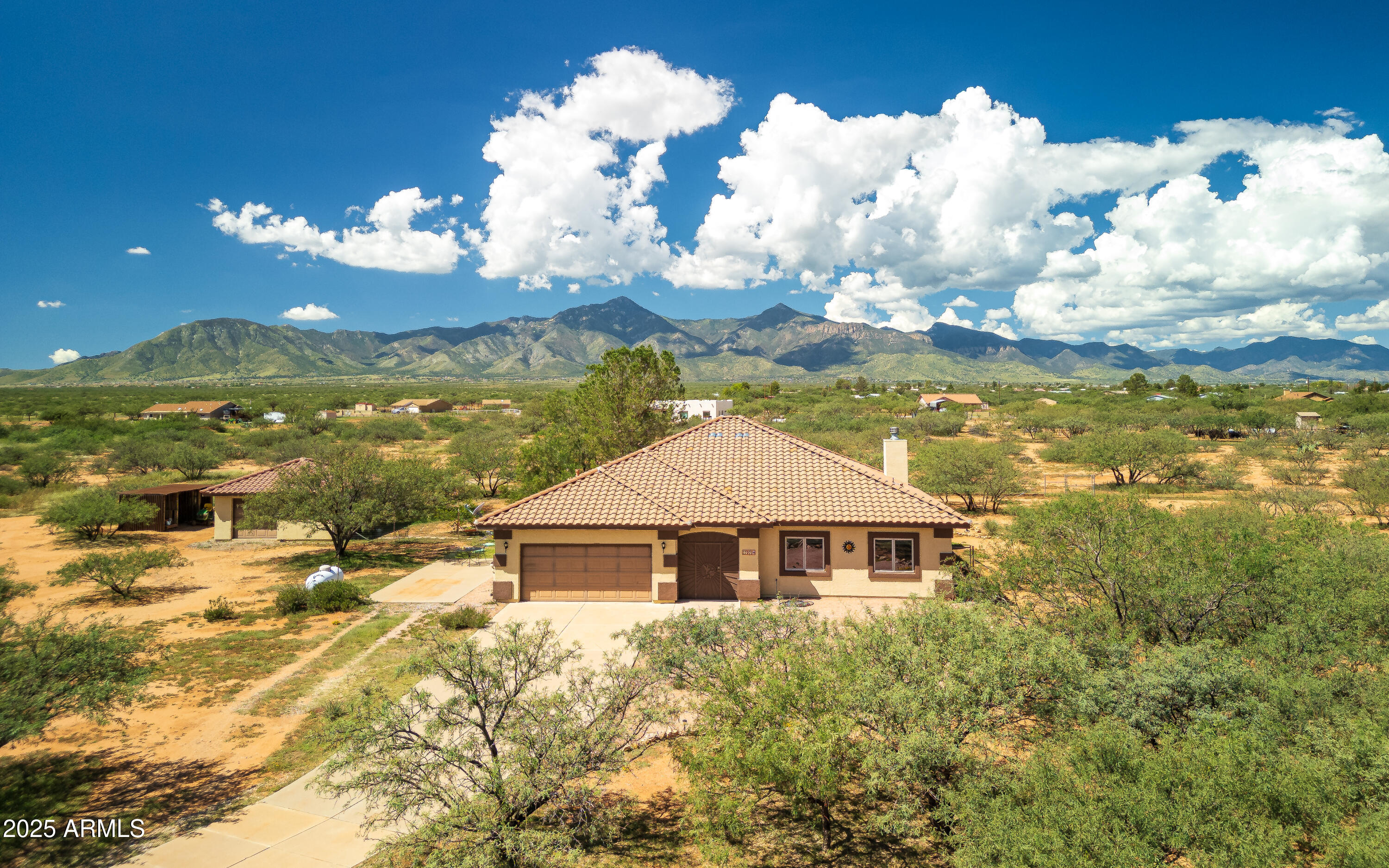 7072 South Ridling Drive Hereford, AZ 85615 - Photo 2 of 69 a front view of a house with garden