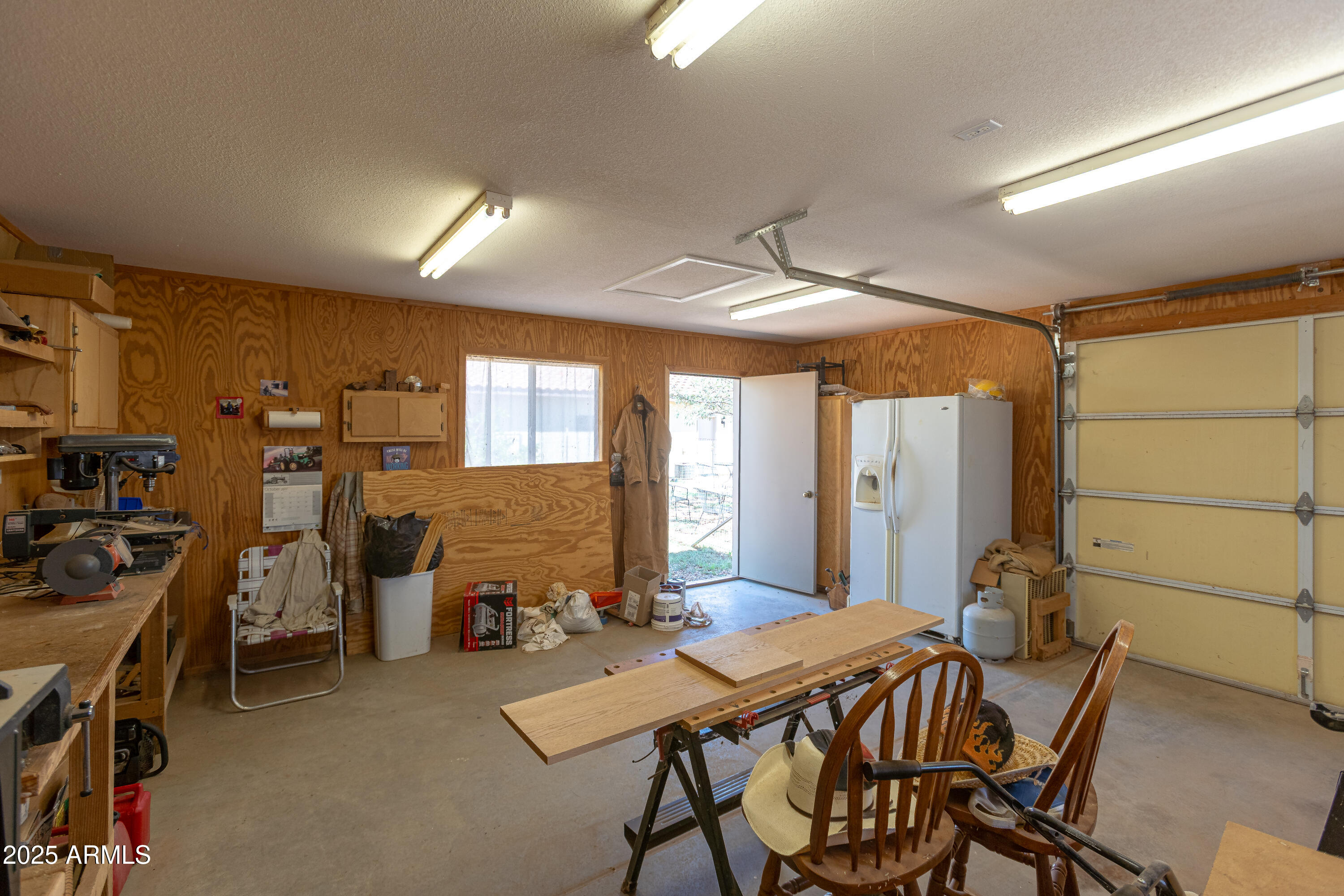 7072 South Ridling Drive Hereford, AZ 85615 - Photo 56 of 69 a view of a dining room with furniture and chandelier