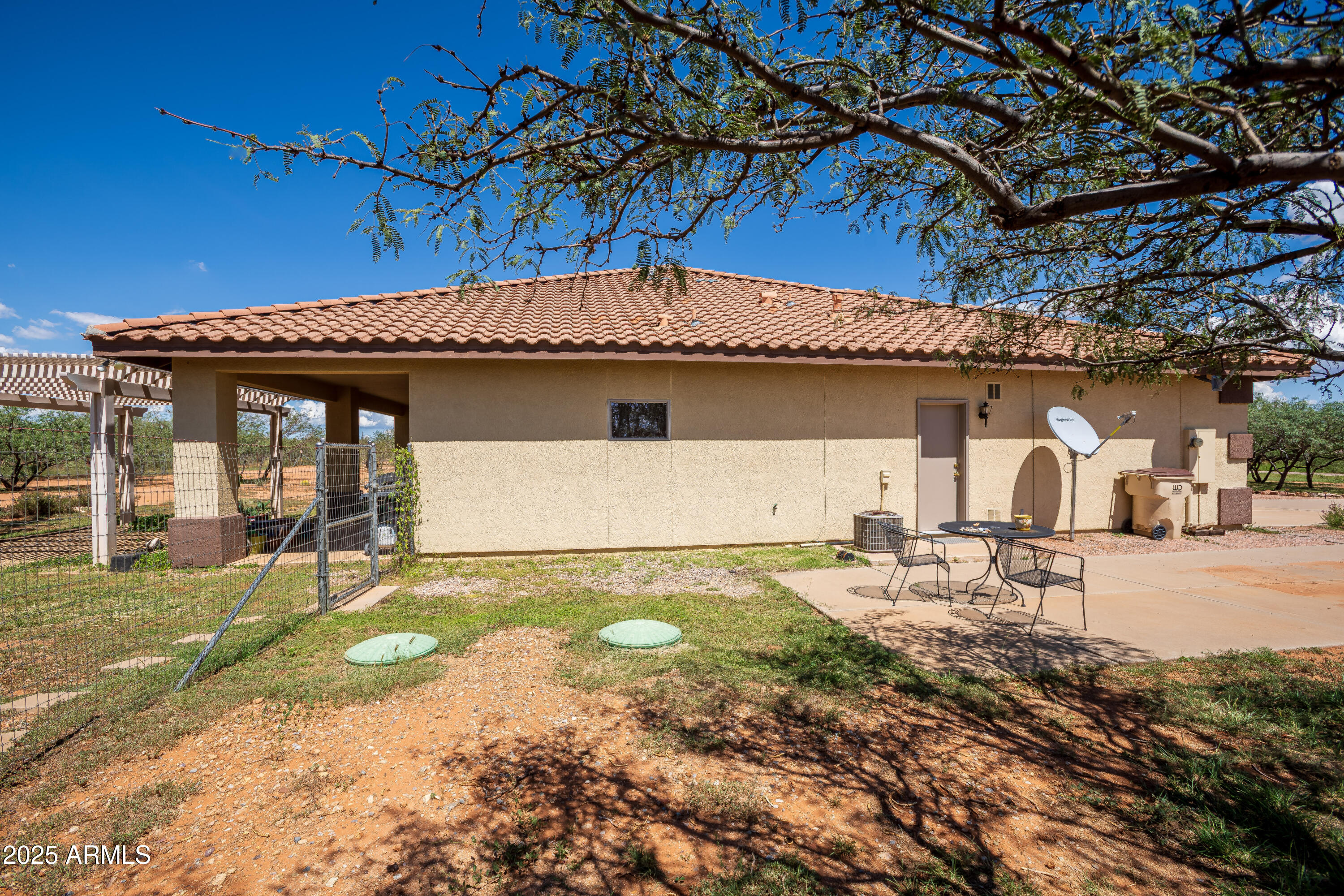7072 South Ridling Drive Hereford, AZ 85615 - Photo 10 of 69 a front view of a house with garden